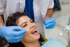 Woman getting a family dentistry exam